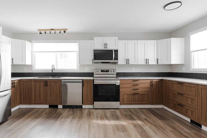 Property Photo:  209 Woodland Drive  AB T9K 1A4 