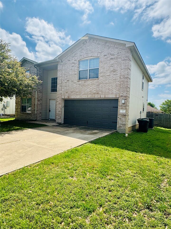 Property Photo:  303 Wegstrom Street  TX 78634 