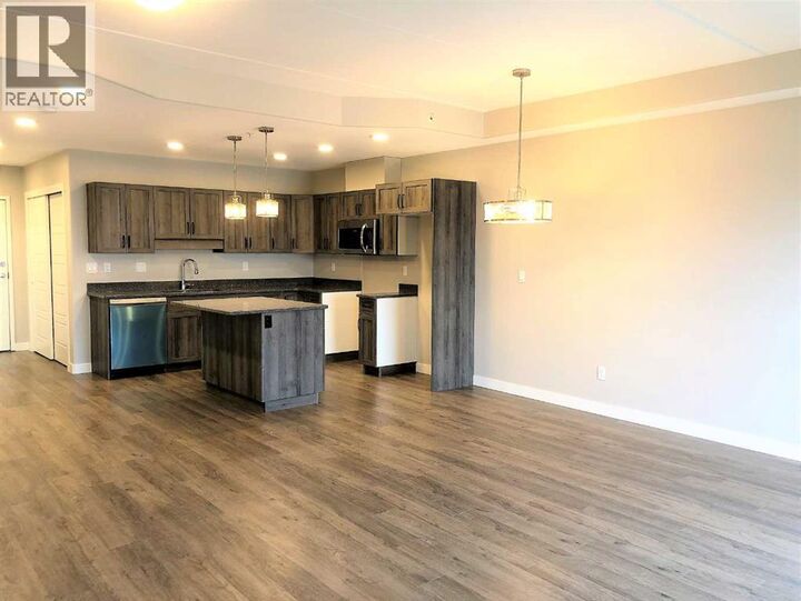 Property Photo: 499 Meadow Lake Court East AB T1R 0Y7