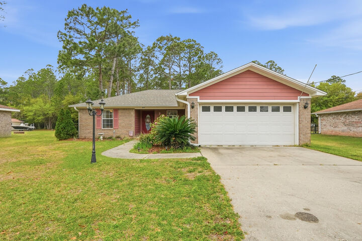 Property Photo:  4237 Melton Road  FL 32583 