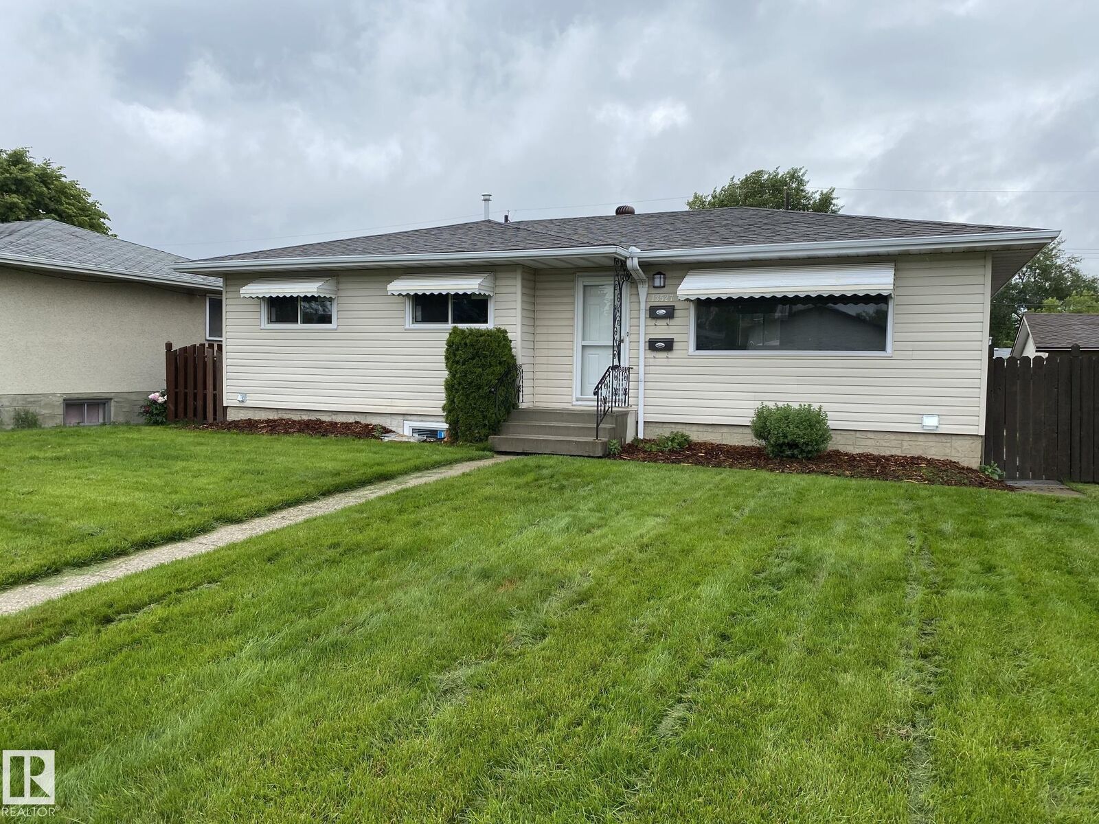 Property Photo: 13527 70 Street NW AB T5C 0K5