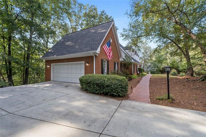 Property Photo: 8705 River Bluff Lane GA 30076