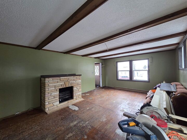Property Photo:  210 Blossom Street  MI 49935 