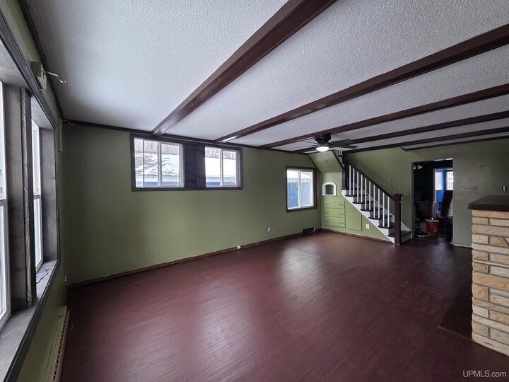 Property Photo:  210 Blossom Street  MI 49935 