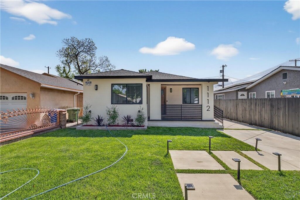 Property Photo:  1112 E 102nd Street  CA 90002 