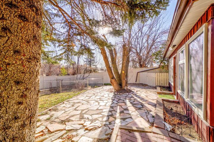 Property Photo:  129 Oxford Road W  AB T1K 4V6 