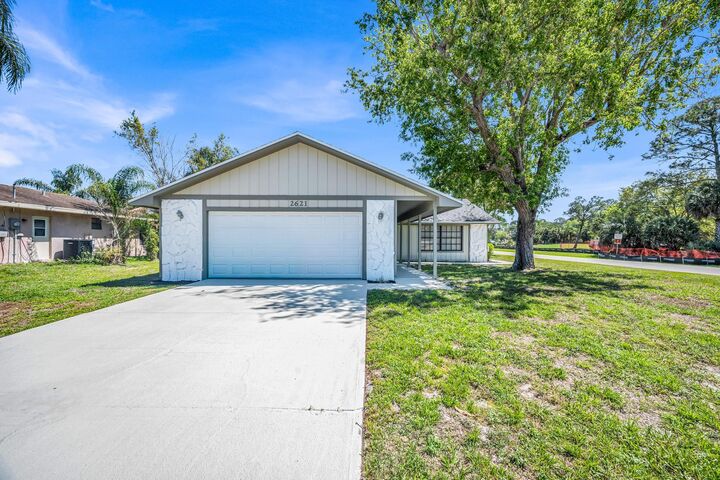 Property Photo:  2621 SE Westmoreland Boulevard  FL 34952 