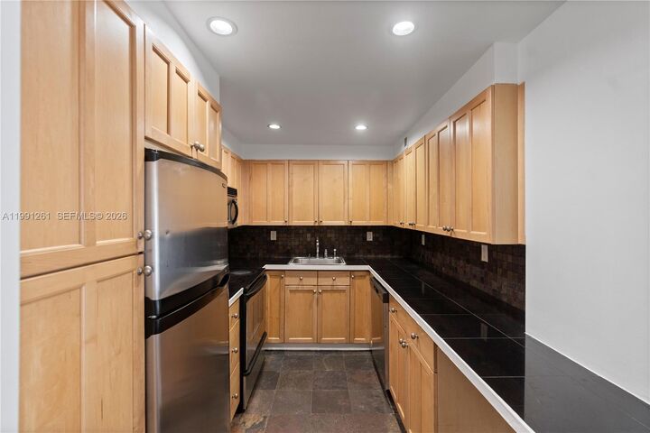 Property Photo: 145 SE 25th Rd 404 FL 33129