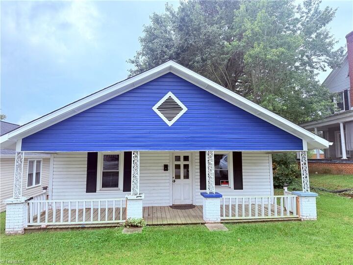 Property Photo:  213 W Decatur Street  NC 27025 