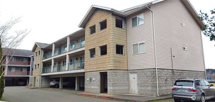 Property Photo: 9735 272nd Street NW 511 WA 98292
