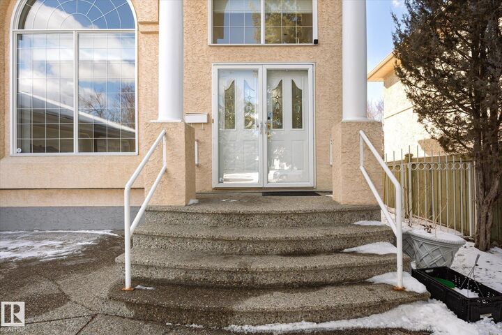 Property Photo: 128 Weaver Drive NW AB T6H 2J3