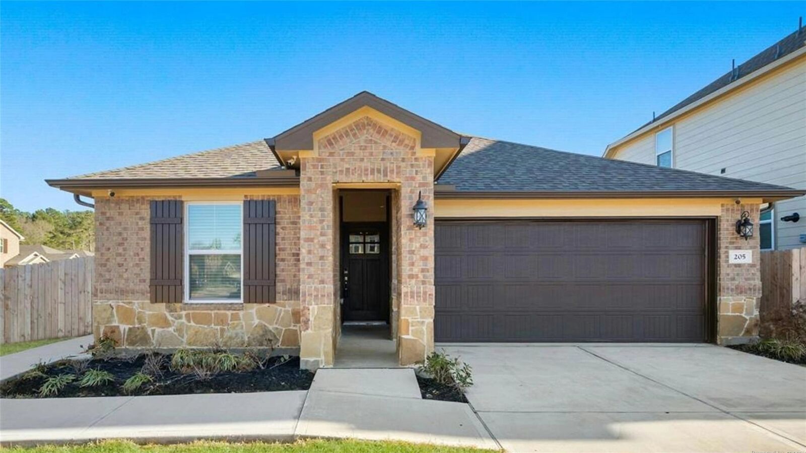 Property Photo:  205 Cresta Cove Court  TX 77316 