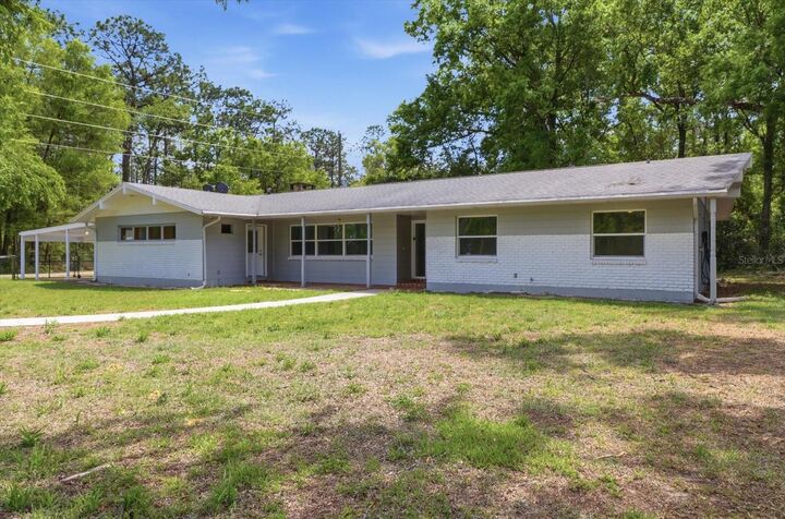 Property Photo:  24576 NW Falcon Avenue  FL 34431 