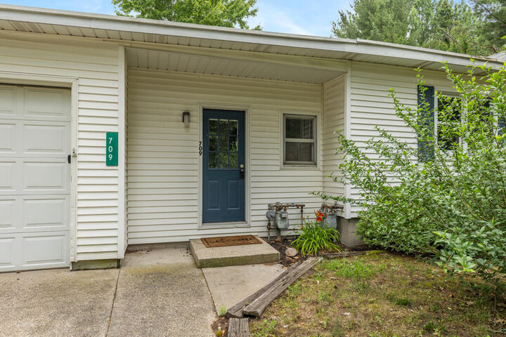 Property Photo:  707 N Maple Street  MI 49453-9439 