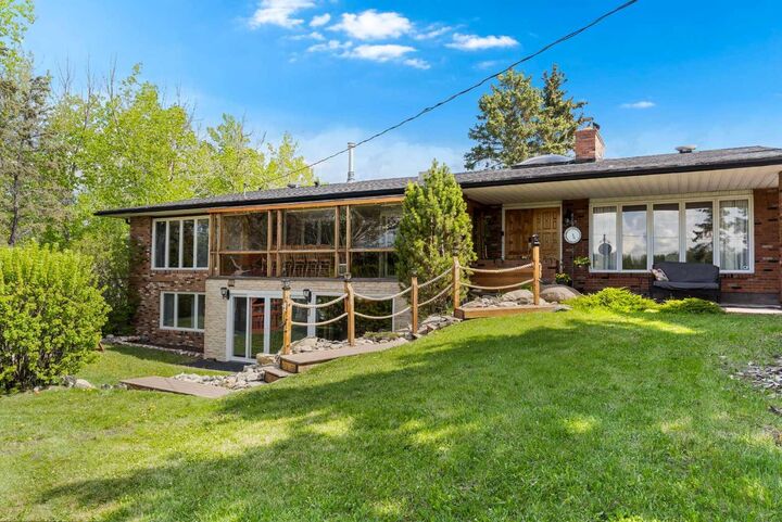 Property Photo:  24157 Meadow Drive  AB T3R 1A8 