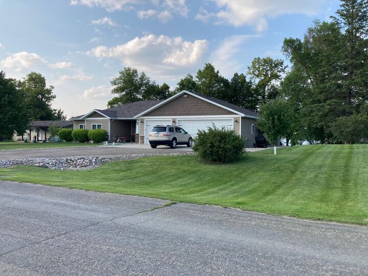 Property Photo:  830 E Scharf Avenue  MN 56587 