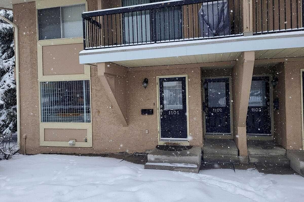 Property Photo: 2200 Woodview Drive SW 1101 AB T2W 3N6