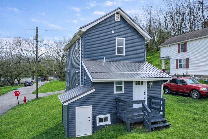Property Photo:  242 Dickens St  PA 15650 