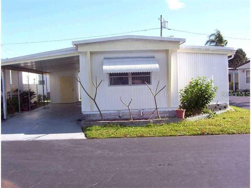 Property Photo:  1600 N Old Coachman Road 716  FL 33765 