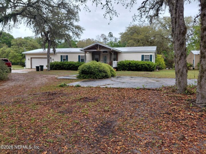 Property Photo:  118 Robin Road  FL 32181 