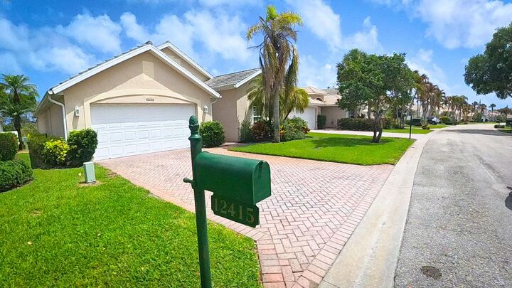 Property Photo:  12415 SE Plandome Drive  FL 33455 