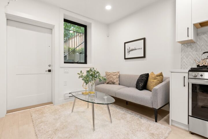 Property Photo:  3588 Pender Street Bsmt  BC V5K 2E3 