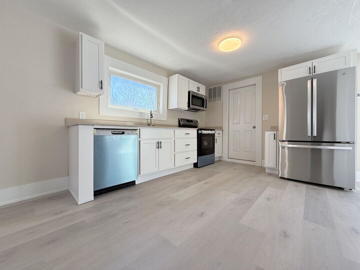 Property Photo:  8 Holman Street  NH 03221 