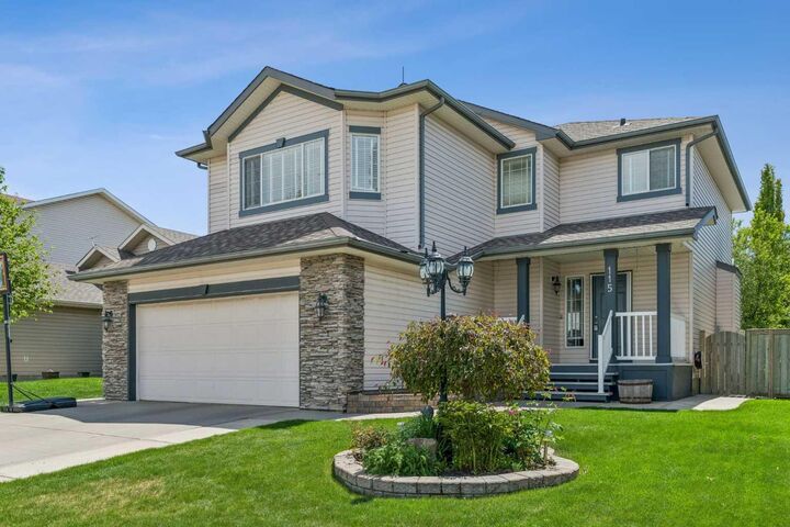 Property Photo: 115 Cove Crescent AB T1X 1J5