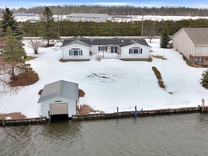 Property Photo:  216 Riverside Drive  MI 49721 