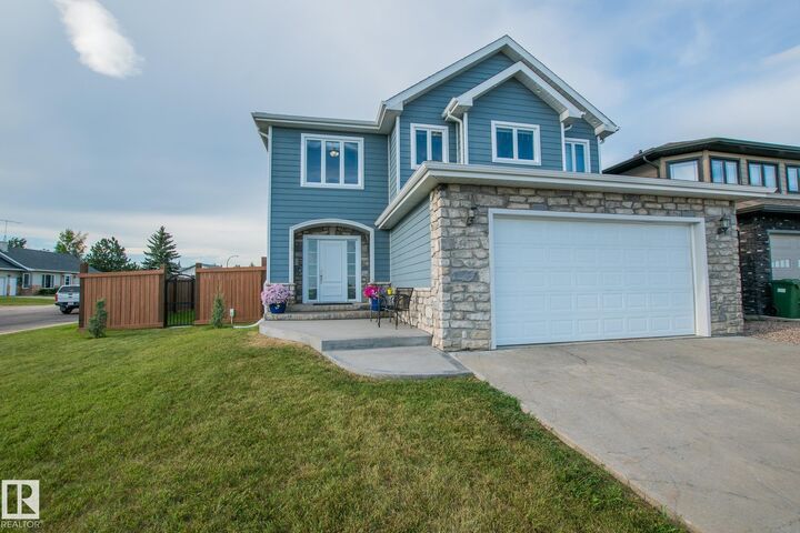 Property Photo: 3719 Lakeshore Drive AB T9N 0A4