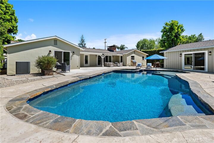 Property Photo:  5823 Lubao Avenue  CA 91367 