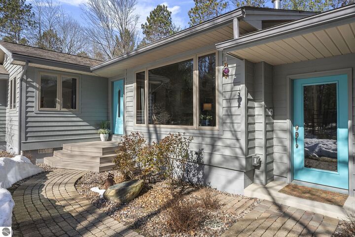 Property Photo:  793 W Long Lake Road  MI 49685 