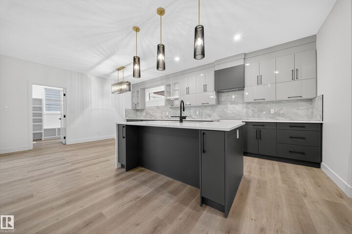 Property Photo: 6117 Crawford Drive SW AB T6W 4L7
