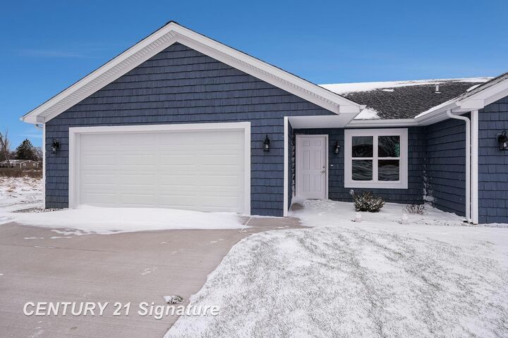 Property Photo:  8487 N River Rock Drive  MI 48623 