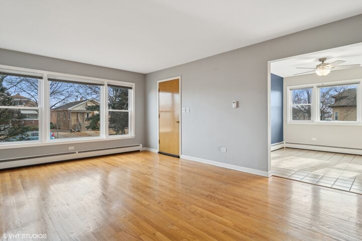 Property Photo: 1600 N 17th Avenue 1 IL 60160