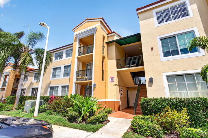Property Photo:  157 Yacht Club Way 303  FL 33462 