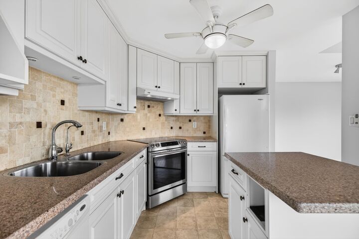 Property Photo: 7554 Briskham Street 310 BC V2V 3L9