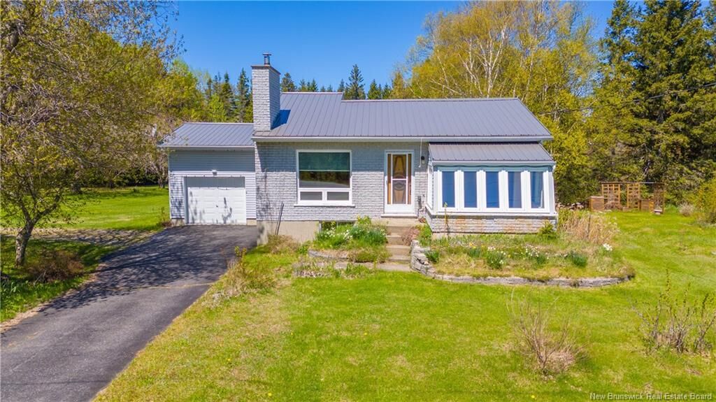 Property Photo: 568 Des Acadiens Boulevard NB E1W 1G6