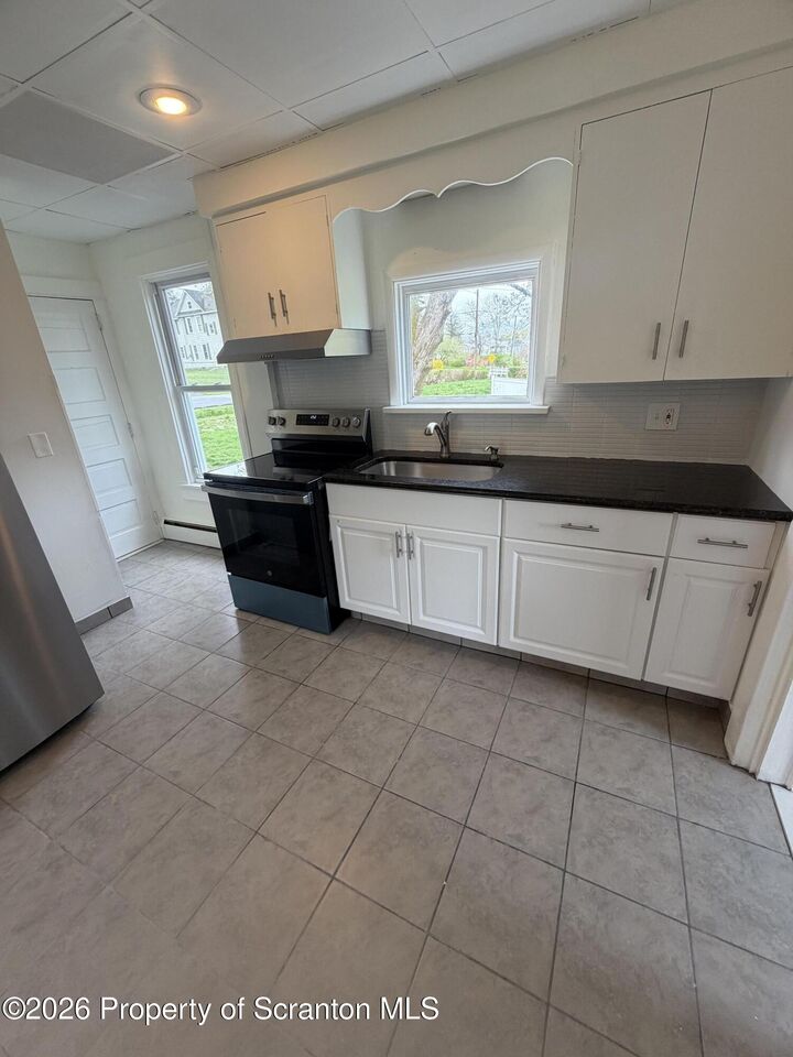 Property Photo:  207 Midway Avenue  PA 18411 