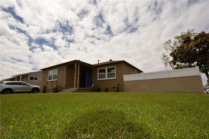 Property Photo:  8903 Songfest  CA 90660 