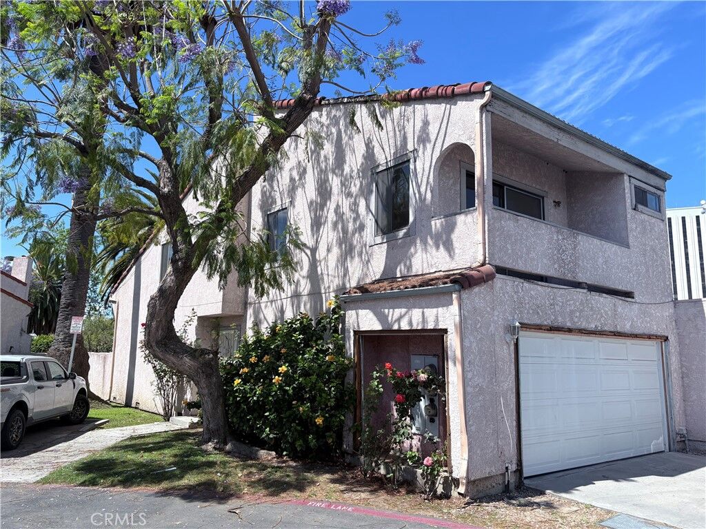 Property Photo:  134 Racquet Club  CA 90220 