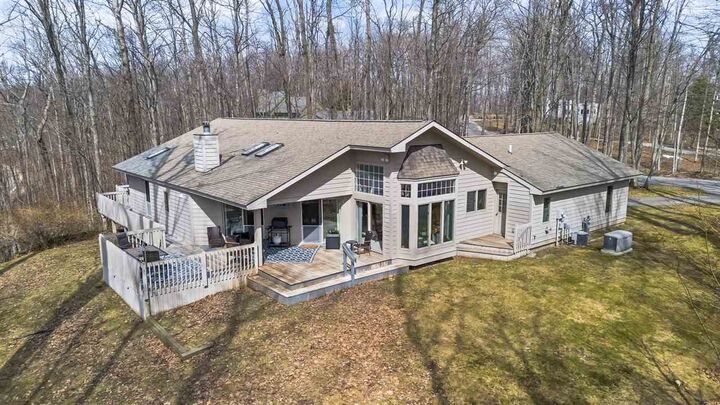 Property Photo:  1826 Bluffs Edge  MI 49740 