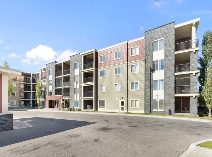 Property Photo: 5 Saddlestone Way NE 312 AB T3J 0S2