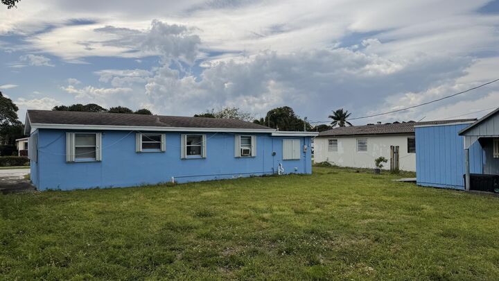 Property Photo:  311 NW 11th Avenue  FL 33444 