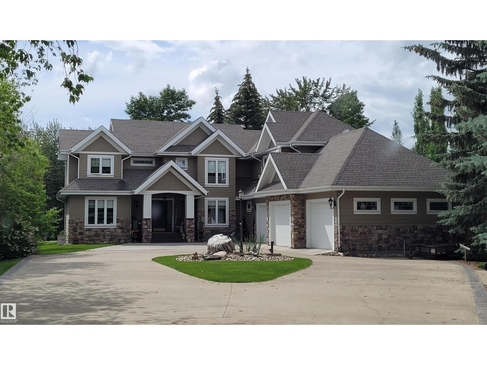Property Photo: #16 53226 Rge Road 261 AB T7Y 1A3