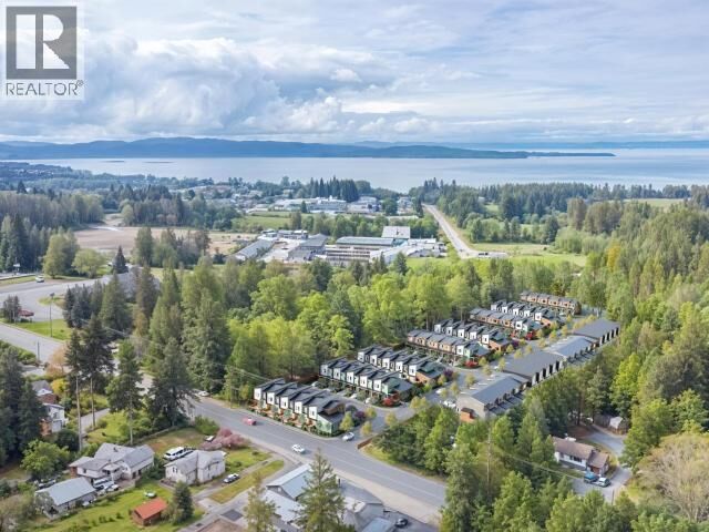Property Photo:  203-5191 Manson Ave  BC V8A 3P2 