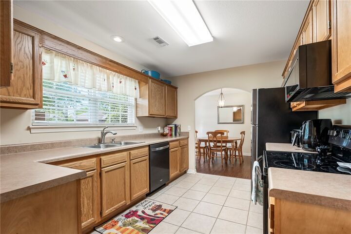 Property Photo:  3900 SW Carriageway Avenue  AR 72712 