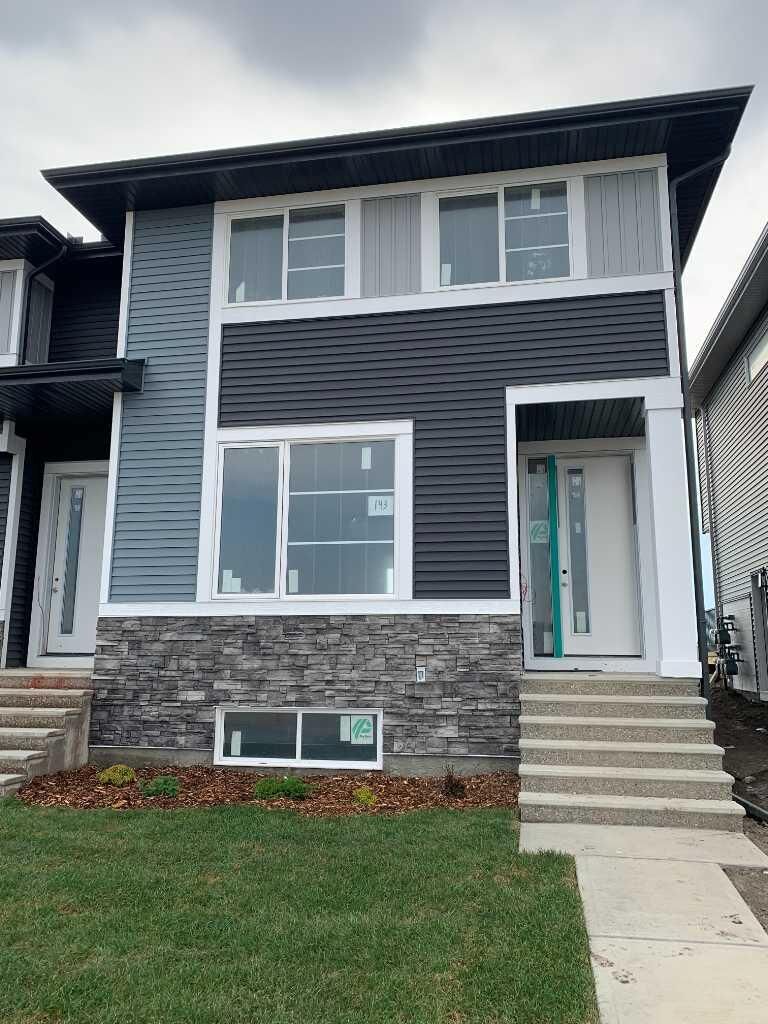 Property Photo: 143 Ambleridge Street E AB T3P 3H2