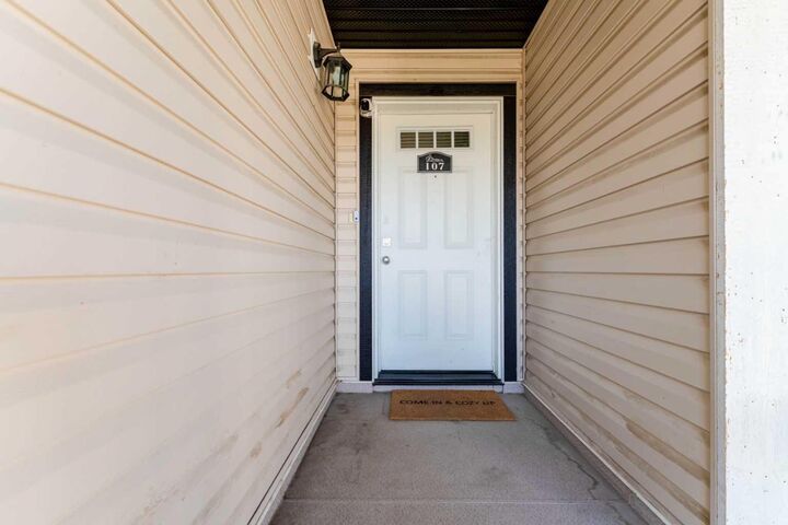 Property Photo: 8 Bayside Place 107 AB T1P 0E1