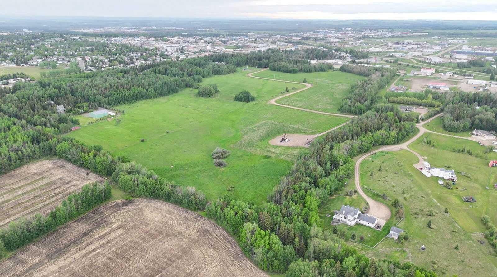 Property Photo: 4803 Mitchell Dr AB T7A 1V1